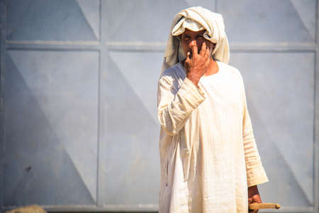 Massawa, Eritrea - November 04, 2019: Old Man in traditional Clothes on the street