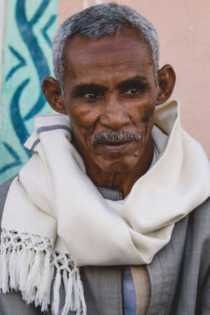 Luxor, Egypt - November 07, 2021: Close up Portrait of the Local Egyptian Old Man in Traditional Clothesのeditorial素材