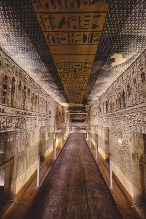 Luxor, Egypt - November 08, 2021: Majestic Interior View to the Corridor and Walls with hieroglyphics and other painting in the Pharaoh Tomb in the Valley of the Kingsのeditorial素材