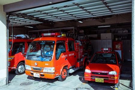 Miyajima, Japan - January 02, 2020: Cityscape to the Walking Tourists and  Itsukushima streets