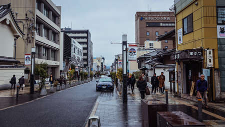 Nara, Japan - January 09, 2020: Rainy and Cloudy Cityscape View to the Nara City Streets and...