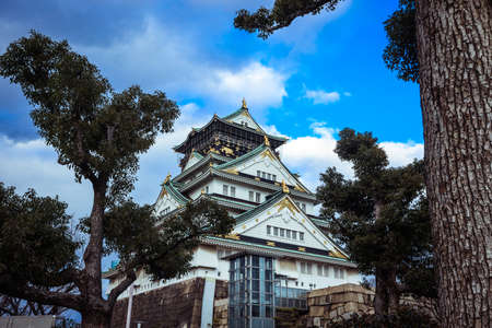View to the Sunset Castle under Blue Sky and Trees, Japanのeditorial素材