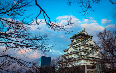 View to the Sunset Castle under Blue Sky and Trees, Japanのeditorial素材