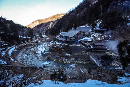 Yudanaka, Japan - January 08, 2020:  Winter View to the Small Japanese Village on the Forest Path Way to the Jigokudani Monkey Parkのeditorial素材