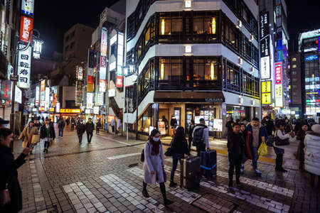 Tokyo, Japan - January 08, 2020: Tourists and Local People walking on the Beautiful Tokyo street...