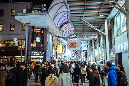 Himeji, Japan - January 14, 2020: Crowded Himeji Illuminated Street with Local Japanese People and Tourists walkingのeditorial素材