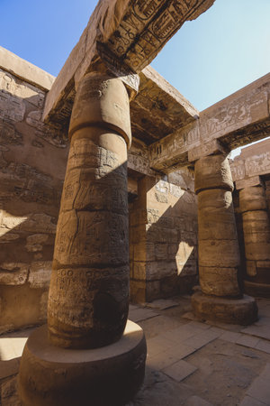 Luxor, Egypt - November 11, 2020: Ancient Massive Columns of Karnak Temple Complex in the Great Hypostyle Hall in the Precinct of Amun-Reの写真素材