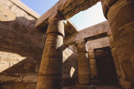 Luxor, Egypt - November 11, 2020: Ancient Massive Columns of Karnak Temple Complex in the Great Hypostyle Hall in the Precinct of Amun-Reの写真素材