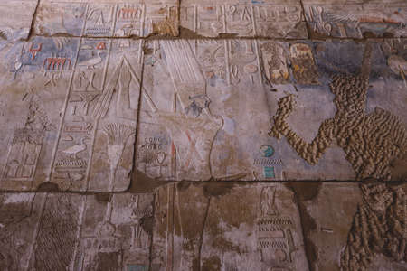 Luxor, Egypt - November 11, 2020: Ancient Egyptian Drawing on the Sandstone Pillar in the Hypostyle...