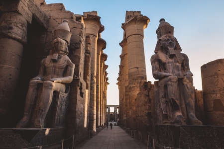 Ancient Egyptian Ruins of God Statues near the Pylon of Luxor Temple, Egyptの写真素材