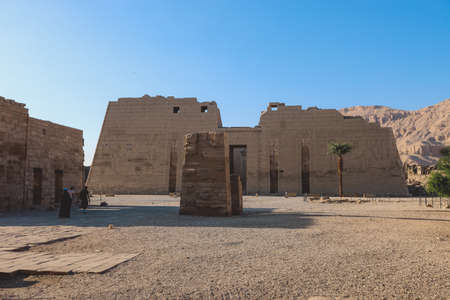Main view to an Ancient Egyptian Medinet Habu, Mortuary Temple of Ramesses III, near the Luxorの写真素材