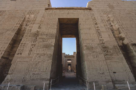 Main view to an Ancient Egyptian Medinet Habu, Mortuary Temple of Ramesses III, near the Luxor