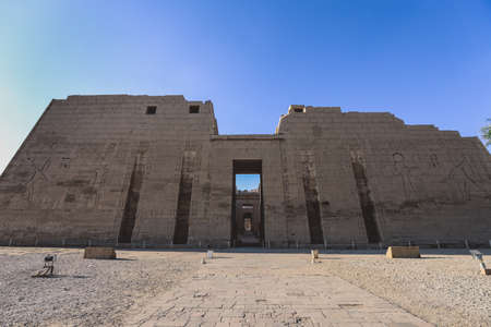 Main view to an Ancient Egyptian Medinet Habu, Mortuary Temple of Ramesses III, near the Luxorの写真素材
