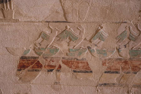 Luxor, Egypt - November 13, 2020: Ancient Egyptian Drawing on the Walls of Mortuary Temple of...