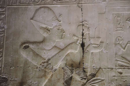 Ancient Egyptian Drawing on the Walls of the temple of Seti I also known as the Great Temple of Abydos in Kharga, Egyptの写真素材