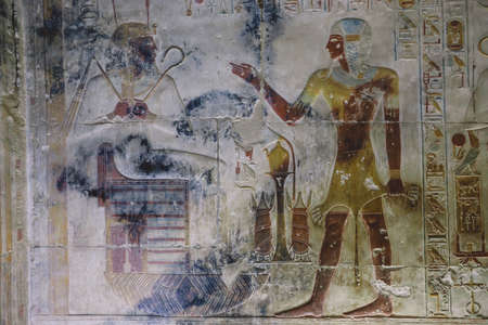Ancient Egyptian Drawing on the Walls of the temple of Seti I also known as the Great Temple of...