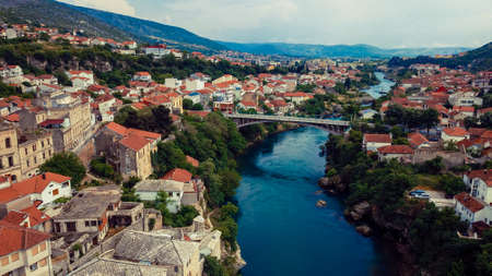 Aerial View to the Old Bridge in the heart of the Old City of Mostar, Bosnia and Herzegovinaの写真素材