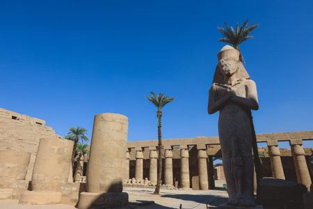 Ancient Sandstone Ruins of Old  Egyptian God in the Karnak Temple Complex near Luxor, Egyptのeditorial素材