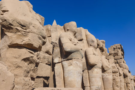 Ancient Sandstone Ruins of Old  Egyptian God in the Karnak Temple Complex near Luxor, Egyptのeditorial素材