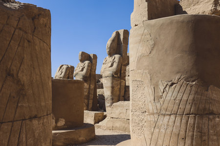 Ancient Sandstone Ruins of Old  Egyptian God in the Karnak Temple Complex near Luxor, Egyptのeditorial素材