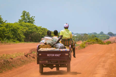 Accra, Ghana - April 06, 2022: Local African People doing daily job in Ghana Village, Western Africaの写真素材