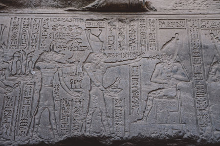 View to an Ancient Egyptian Drawing on the Walls of the Dendera Temple complex in south-east of Dendera, Egyptのeditorial素材