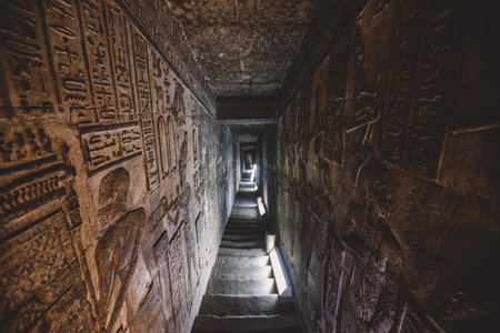 View to an Ancient Egyptian Drawing on the Walls of the Dendera Temple complex in south-east of Dendera, Egyptのeditorial素材