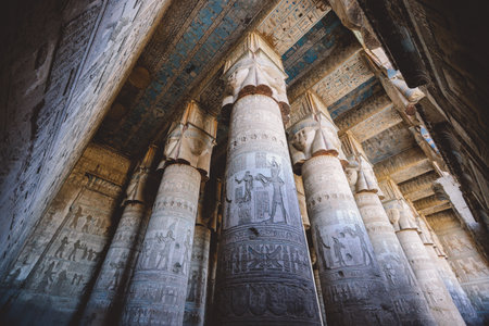 View to an Ancient Egyptian Painted Pillars of the Dendera Temple complex in south-east of Dendera, Egyptのeditorial素材