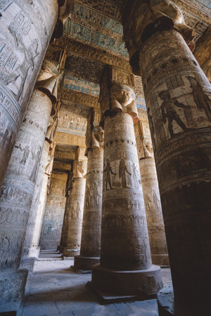 View to an Ancient Egyptian Painted Pillars of the Dendera Temple complex in south-east of Dendera, Egyptのeditorial素材