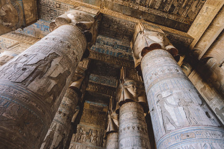 View to an Ancient Egyptian Painted Pillars of the Dendera Temple complex in south-east of Dendera, Egyptのeditorial素材