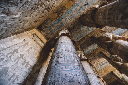 View to an Ancient Egyptian Painted Pillars of the Dendera Temple complex in south-east of Dendera, Egyptのeditorial素材