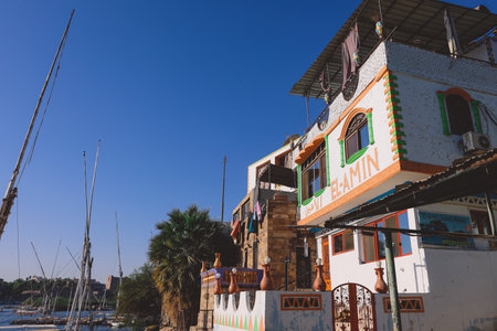 Nice View to the Street with Cars and Local Buildings of Aswan cityscape, Egyptのeditorial素材