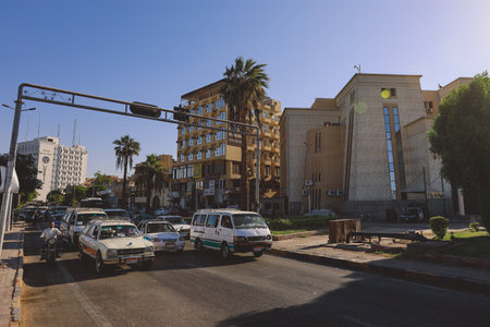 Nice View to the Street with Cars and Local Buildings of Aswan cityscape, Egyptのeditorial素材