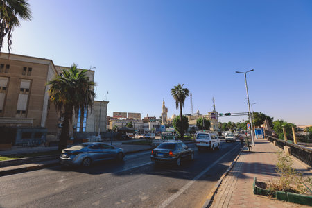 Nice View to the Street with Cars and Local Buildings of Aswan cityscape, Egyptのeditorial素材