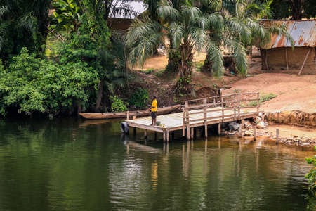 Amazing Natural Landscapes of Ghana Atlantic Ocean Coastline with Green Forest and Blue Water, West Africaの写真素材