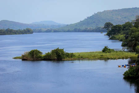 Amazing Natural Landscapes of Ghana Atlantic Ocean Coastline with Green Forest and Blue Water, West Africaの写真素材