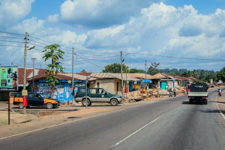 Scenic African Road under the Blue Sky in Ghana, West Africaの写真素材