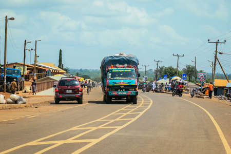 Scenic African Road under the Blue Sky in Ghana, West Africaの写真素材