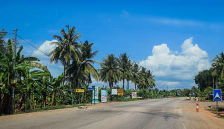 Scenic African Road under the Blue Sky in Ghana, West Africaの写真素材