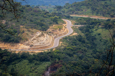 Scenic African Road under the Blue Sky in Ghana, West Africaの写真素材