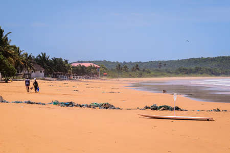 Amazing View to the Sandy Atlantic Coastline of Axim Beach in Ghana, West Africaの写真素材