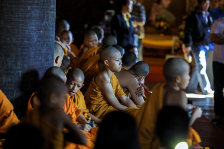 Pattaya, Thailand - June 20, 2022: Monks of the Sanctuary of Truth in Yellow Kasaya clothingのeditorial素材
