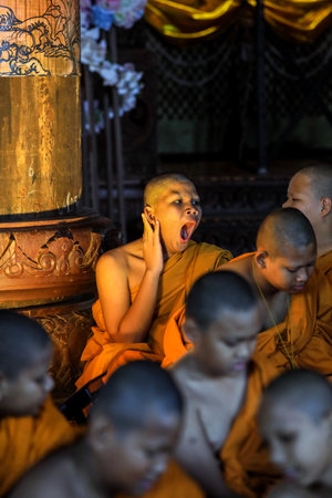 Pattaya, Thailand - June 20, 2022: Monks of the Sanctuary of Truth in Yellow Kasaya clothingのeditorial素材