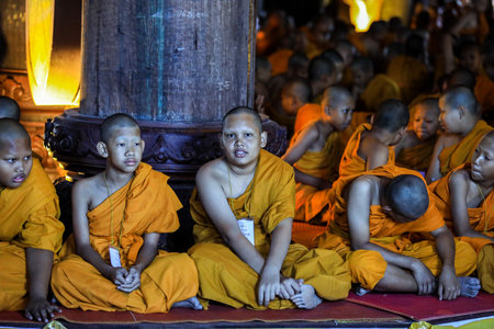 Pattaya, Thailand - June 20, 2022: Monks of the Sanctuary of Truth in Yellow Kasaya clothingのeditorial素材