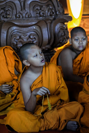 Pattaya, Thailand - June 20, 2022: Monks of the Sanctuary of Truth in Yellow Kasaya clothingのeditorial素材