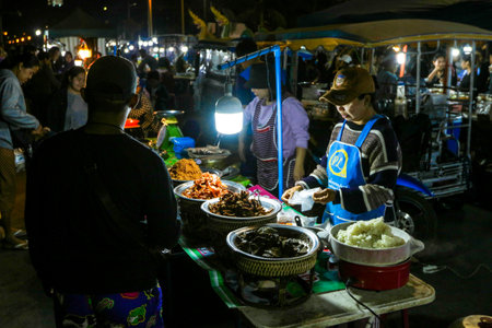 Pattaya, Thailand - March 21, 2022: Local Thai Merchants on the Asian Night Market selling the different fast foodのeditorial素材