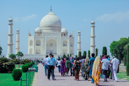Agra, India - March 05, 2023: Local Indian People visiting the Taj Mahal in the Sunny Dayのeditorial素材