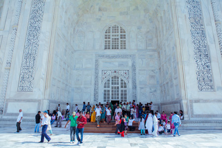 Agra, India - March 05, 2023: Local Indian People visiting the Taj Mahal in the Sunny Dayのeditorial素材