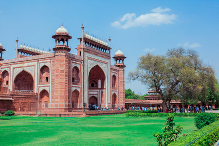 Main View to the Great Gate of Taj Mahal Temple with the green grass, Indiaの写真素材
