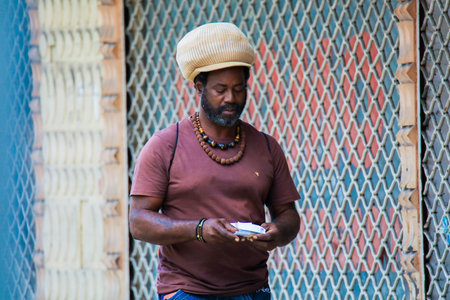 Pointe-a-Pitre, Guadeloupe - October 30, 2022: Local Men with Authentic appearance on the Guadalupe streetのeditorial素材